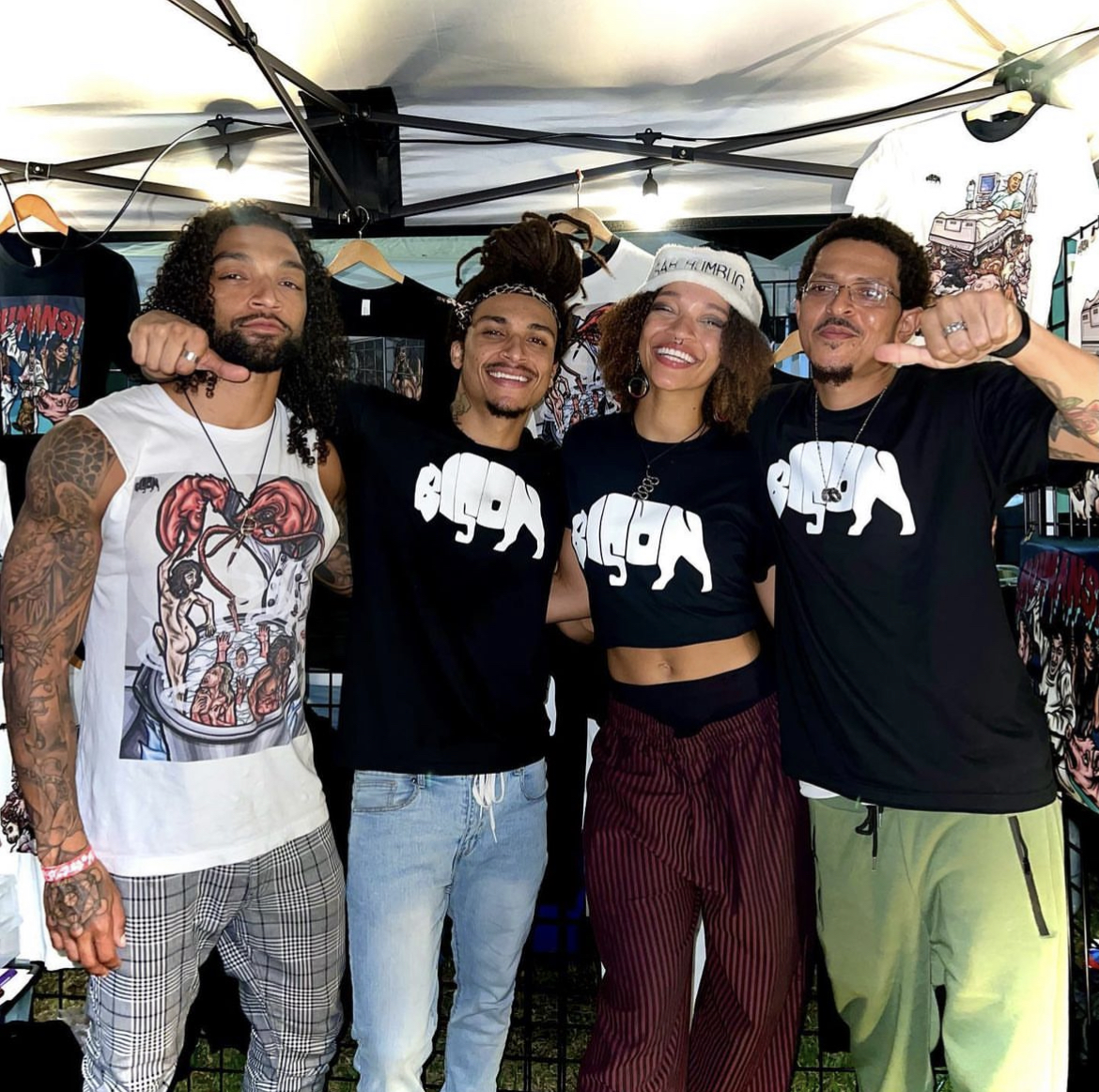 The Bison Movement night booth with vegan streetwear and lights